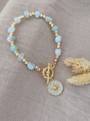 Nakkash Pozłacana bransoletka z kamieniami szlachetnymi rozmiar: onesize. Niebieskie bransoletki Nakkash, z agatem, pozłacane. Za 96.37 zł.