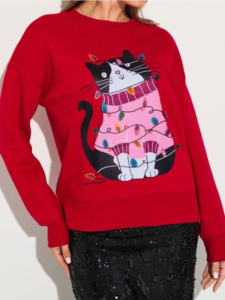 Bluza crewneck z motywem świątecznym - czerwony. Czerwone bluzy Sinsay, l, bez wzorów, bez kaptura. Za 49.99 zł.