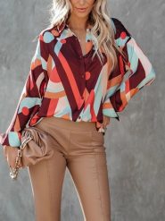 Milan Kiss Bluzka ze wzorem rozmiar: M. Bluzki Milan Kiss, m, bez wzorów, bez kołnierzyka, bez ramiączek. Za 153.71 zł.