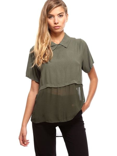 Dioxide Bluzka w kolorze zielonym rozmiar: L. Zielone bluzki Dioxide, l, bez wzorów, bez kołnierzyka, bez ramiączek. Za 125.85 zł.