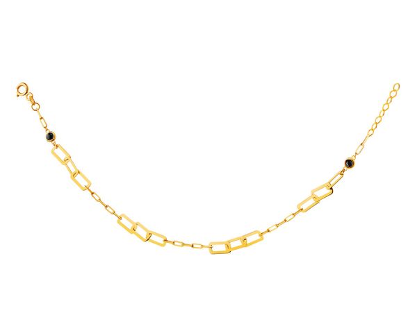 Złota bransoletka z cyrkoniami - paper clip. Żółte bransoletki Apart, z cyrkonią, złote. Za 629.00 zł.