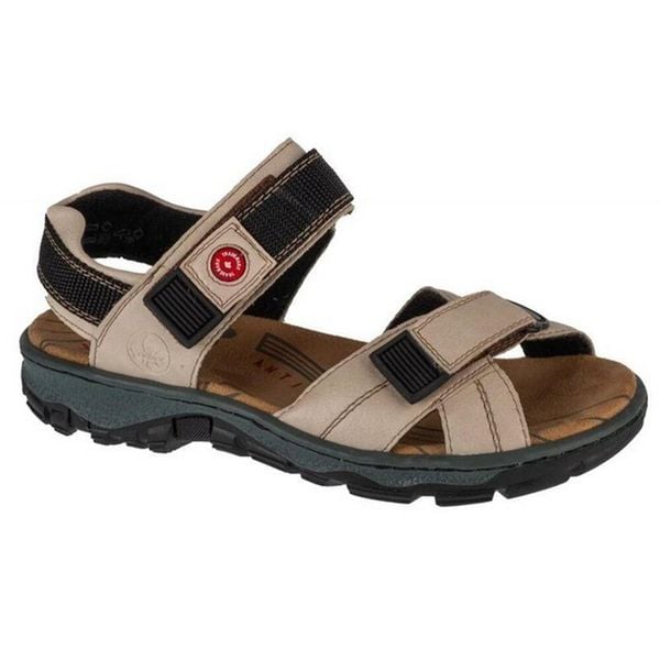Sandały Damskie Z Kontrastowymi Detalami. Czarne sandały Rieker, bez wzorów, z gumy, bez obcasa, na obcasie, bez zapięcia. Za 344.99 zł.