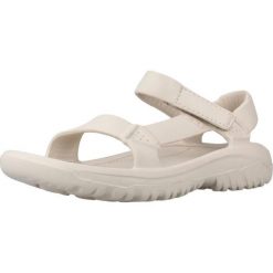 Sandały TEVA W HURRICANE DRIFT Beżowy. Brązowe sandały Teva, bez wzorów, z syntetyku, sportowe, bez obcasa, bez zapięcia. Za 158.99 zł.