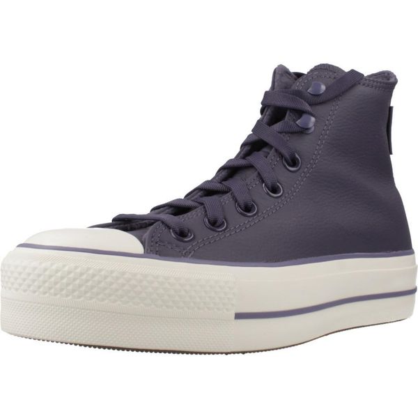 Buty CONVERSE CHUCK TAYLOR ALL STAR LIFT HI SHADOW Fioletowy. Fioletowe obuwie sportowe Converse, ze skóry, bez zapięcia. W wyprzedaży za 421.95 zł.