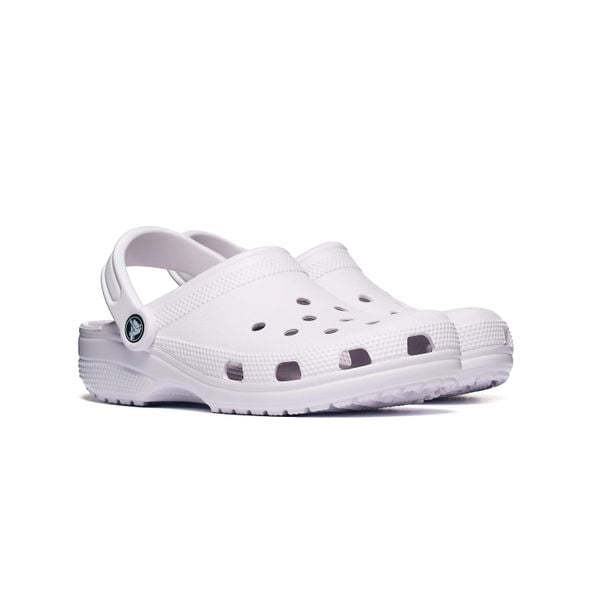 Klapki Crocs CLASSIC 10001-5DK. Fioletowe klapki Crocs, bez wzorów, z materiału, z okrągłym noskiem, bez obcasa. Za 278.91 zł.
