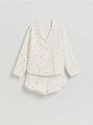 Dwuczęściowa piżama - złamana biel. Piżamy Reserved, bez wzorów, z bawełny, bez ramiączek. Za 149.99 zł.