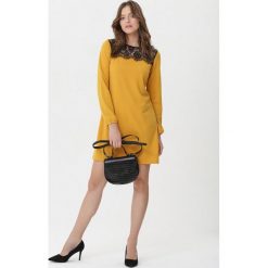 Żółta Sukienka Doreen. Żółte sukienki Born2be, na jesień, l, bez wzorów, z dzianiny, wizytowe, bez kołnierzyka, bez ramiączek. Za 69.99 zł.
