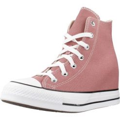Kapcie CONVERSE CHUCK TAYLOR ALL STAR WEDGE Czerwony. Czerwone obuwie domowe Converse, bez wzorów, bez zapięcia. Za 368.99 zł.