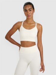 4F Biustonosz treningowy z niskim wsparciem - beżowy M/L. Brązowe bielizna sportowa 4f, l, bez wzorów, z elastanu. Za 119.99 zł.