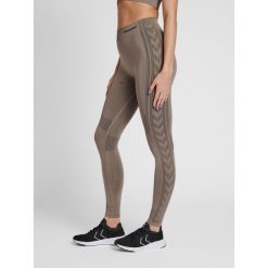Damskie legginsy mid-rise Hummel Shaping. Szare legginsy Hummel, s, bez wzorów, z materiału. Za 149.50 zł.