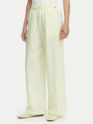 Tommy Jeans Spodnie materiałowe DW0DW22285 Zielony jasny Loose Fit. Zielone spodnie materiałowe Tommy Jeans, l, bez wzorów, z jeansu. Za 409.99 zł.