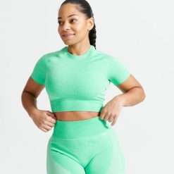Koszulka fitness damska Domyos krótki rękaw. Zielone biustonosze DOMYOS, bez wzorów, z elastanu. W wyprzedaży za 59.99 zł.