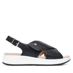 Sandały Caprice. Czarne sandały Caprice, bez wzorów, bez obcasa, na płaskiej podeszwie, bez zapięcia. Za 399.99 zł.