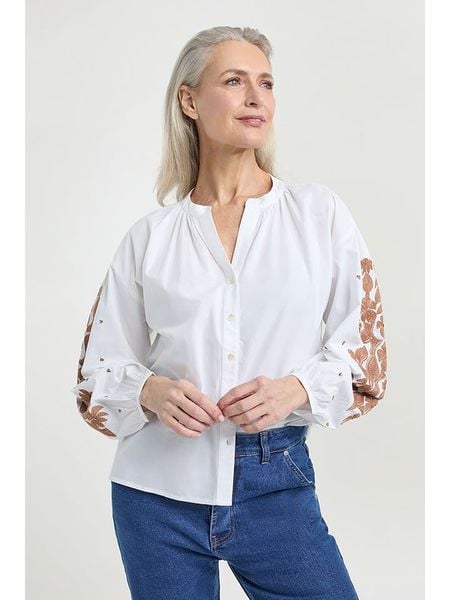 Josephine & Co Bluzka "Jet" w kolorze białym rozmiar: 42. Białe bluzki Josephine & Co, bez wzorów, z bawełny, bez kołnierzyka, bez ramiączek. Za 222.94 zł.