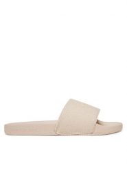 Calvin Klein Jeans Klapki Slide Monogram Wn YW0YW01835 Beżowy. Brązowe klapki Calvin Klein Jeans, bez wzorów, z jeansu, bez obcasa. Za 109.99 zł.
