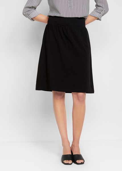 Spódnica z wszytymi kolarkami z elastycznej mieszanki z bawełną. Czarne spódnice bonprix, bez wzorów, z bawełny. Za 99.99 zł.