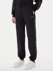 Guess Spodnie dresowe V5BB23 KCX22 Czarny Wide Leg. Czarne spodnie dresowe Guess, xs, z aplikacjami, z dresówki. Za 479.99 zł.