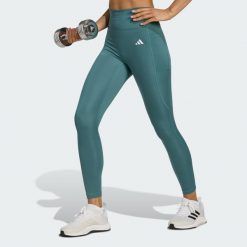 Legginsy 7/8 bez szwu z przodu Optime Essentials. Niebieskie legginsy Adidas, xl, bez wzorów. Za 219.00 zł.