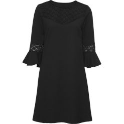 Sukienka z dżerseju z koronką bonprix czarny. Czarne sukienki bonprix, bez wzorów, z dżerseju, bez kołnierzyka, bez ramiączek. Za 59.99 zł.