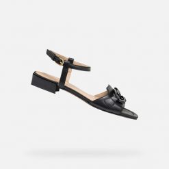 Sandały GEOX D NEW ERAKLIA 15 Czarny. Czarne sandały Geox, bez wzorów, ze skóry, bez obcasa, bez zapięcia. Za 435.99 zł.