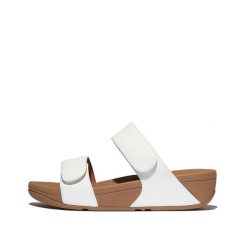 Kobiece skórzane sandały na koturnie z regulacją FitFlop Lulu. Białe sandały FIT FLOP, bez wzorów, z materiału, bez obcasa, na koturnie, bez zapięcia. Za 530.50 zł.