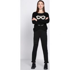 Czarne Spodnie Dresowe Drama. Spodnie dresowe marki Born2be. Za 59.99 zł.
