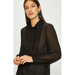 Calvin Klein - Bluzka. Czarne bluzki Calvin Klein, l, bez wzorów, z poliesteru, casualowe, bez kołnierzyka, bez ramiączek. W wyprzedaży za 359.90 zł.