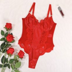 Body z wycięciem na miseczkach na romantyczne wieczory Adelind. Czarne body Intica, l, bez wzorów, z materiału. Za 99.00 zł.