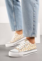 Żółte Trampki z Cholewką Zdobioną Kwiatowym Wzorem Folaianna. Żółte trampki Born2be, z aplikacjami, z jeansu, bez zapięcia. Za 39.99 zł.