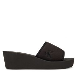 Klapki Calvin Klein Jeans. Czarne klapki Calvin Klein Jeans, bez wzorów, z jeansu, bez obcasa. Za 159.99 zł.