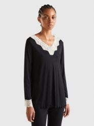 Benetton Bluzka w kolorze czarno-białym rozmiar: XS. Białe bluzki Benetton, xs, bez wzorów, z koronki, bez kołnierzyka, bez ramiączek. Za 41.98 zł.