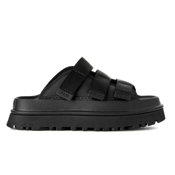 Damskie japonki klapki W GOLDENGLOW SLIDE. Czarne klapki UGG, bez wzorów, z materiału, bez obcasa. Za 506.40 zł.