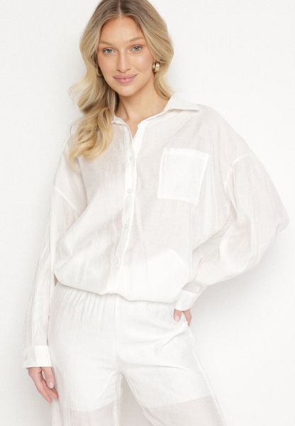 Biała Klasyczna Koszula o Kroju Oversize z Kieszonką Liorea. Białe koszule Born2be, l, bez wzorów, z jeansu, biznesowe, bez kołnierzyka, bez ramiączek. Za 109.99 zł.