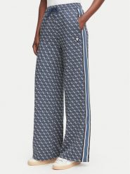Guess Spodnie dresowe V6YB27 K5181 Granatowy Relaxed Fit. Niebieskie spodnie dresowe Guess, m, z aplikacjami, z dresówki. Za 474.99 zł.