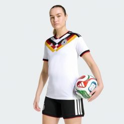 Koszulka podstawowa Germany 26 Women's Team. Białe bluzki Adidas, l, bez wzorów, sportowe, bez kołnierzyka, bez ramiączek. Za 439.00 zł.