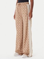 Guess Spodnie dresowe V5YB10 K0282 Brązowy Relaxed Fit. Brązowe spodnie dresowe Guess, s, z aplikacjami, z dresówki. Za 479.99 zł.