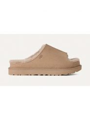 UGG Skórzane kapcie "Greenport" w kolorze beżowym rozmiar: 38. Brązowe obuwie domowe UGG, bez wzorów, ze skóry, z otwartym noskiem, bez zapięcia. Za 461.21 zł.