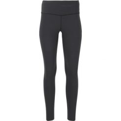 Legginsy modelujące dla kobiet Athlecia Stay. Czarne legginsy Athlecia, bez wzorów. Za 228.50 zł.