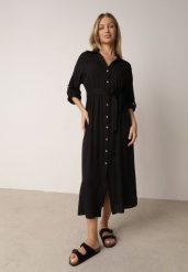 Czarna Bawełniana Sukienka Koszulowa z Paskiem i Regulowanymi Rękawami Sadevia. Czarne sukienki Born2be, do pracy, l, bez wzorów, z bawełny, biznesowe, bez kołnierzyka, bez ramiączek, maxi, koszulowe. Za 119.99 zł.