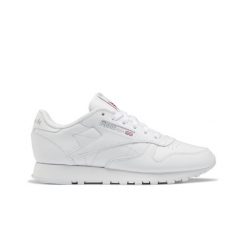 Buty sneakersy sportowe damskie Reebok Classic Leather. Białe obuwie sportowe Reebok, ze skóry, bez zapięcia, trekkingowe, Reebok Classic. W wyprzedaży za 258.00 zł.