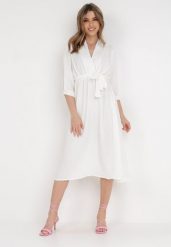 Biała Sukienka Rheniolea. Białe sukienki Born2be, m, bez wzorów, eleganckie, bez kołnierzyka, bez ramiączek, midi, kopertowe. Za 19.99 zł.