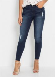 Jeansy o kroju skinny ze średnim stanem, krótsza nogawka. Niebieskie jeansy bonprix, bez wzorów. Za 132.99 zł.