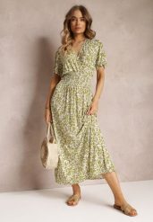 Jasnozielona Rozkloszowana Sukienka Maxi w Kwiaty z Gumką w Pasie Aeyana. Zielone sukienki Renee, m, bez wzorów, bez kołnierzyka, bez ramiączek, maxi, kopertowe. Za 54.99 zł.