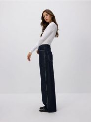 Jeansy wide leg z aplikacjami - granatowy. Niebieskie jeansy Reserved, z aplikacjami. Za 159.99 zł.