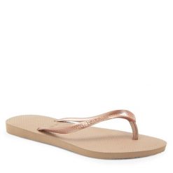 Japonki Havaianas. Żółte klapki Havaianas, bez wzorów, bez obcasa. Za 79.99 zł.