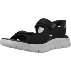Sandały Skechers Model Slip-ins Go Walk Flex Kolor Czarny. Czarne sandały Skechers, bez wzorów, z tkaniny, bez obcasa, bez zapięcia. Za 279.99 zł.
