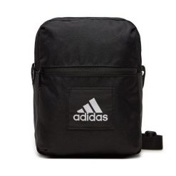 Saszetka adidas. Czarne torby na ramię Adidas, bez wzorów, młodzieżowe, bez dodatków. Za 79.99 zł.