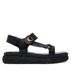 Sandały Guess. Czarne sandały Guess, z aplikacjami, bez obcasa, na płaskiej podeszwie, bez zapięcia. Za 439.99 zł.