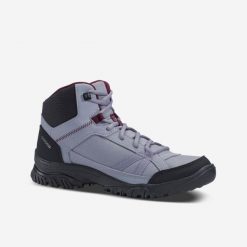 Buty turystyczne damskie Quechua NH100 mid. Brązowe trekkingi QUECHUA, z syntetyku, przed kolano, trekkingowe. W wyprzedaży za 59.99 zł.