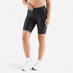 Legginsy do biegania krótkie damskie Kiprun Run 100 Comfort. Czarne legginsy KALENJI, xs, bez wzorów, z elastanu, krótkie. Za 39.99 zł.